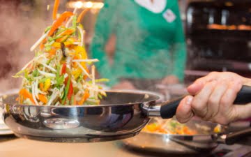 cooking vegetables in a pan
