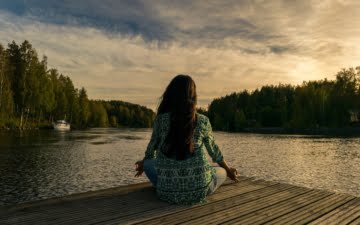 a woman meditates
