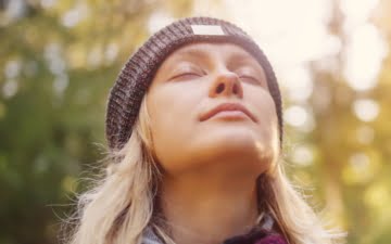 woman facing the sky