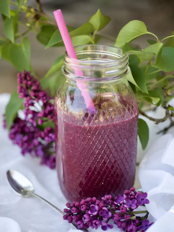 A jar of blueberry smoothie