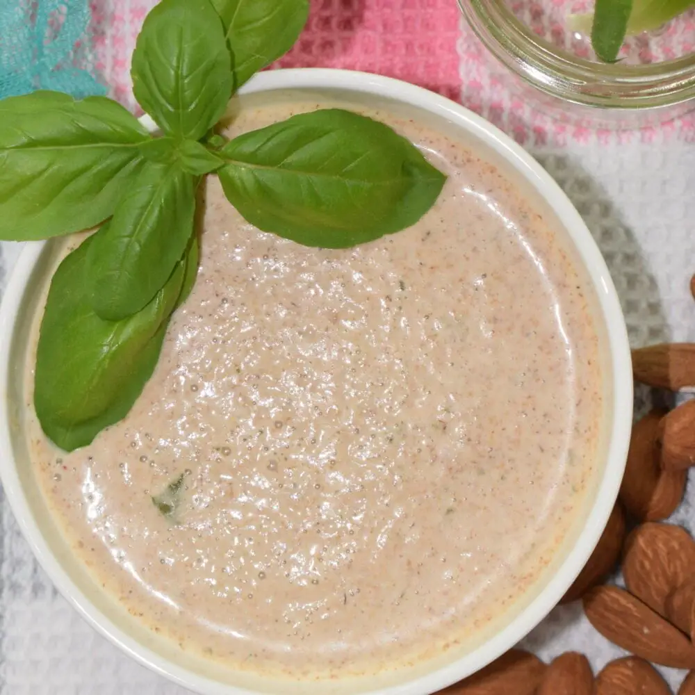 overhead shot of a bowl full of almond and nutmeg vegan sauce