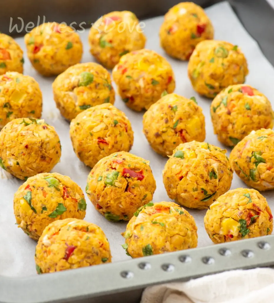 A baking tray with vegan chickpea balls