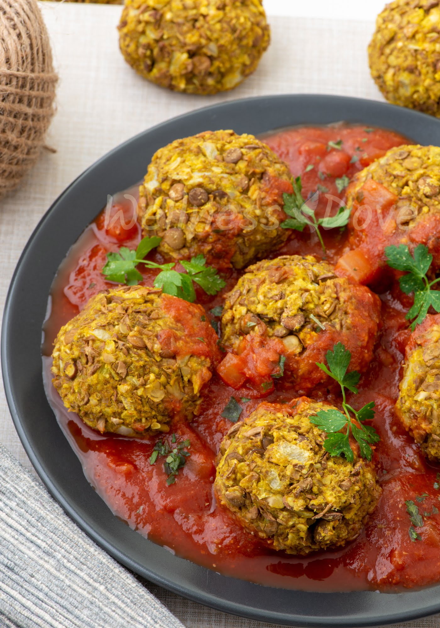 Healthy Lentil Meatballs in Tomato Sauce | WellnessDove