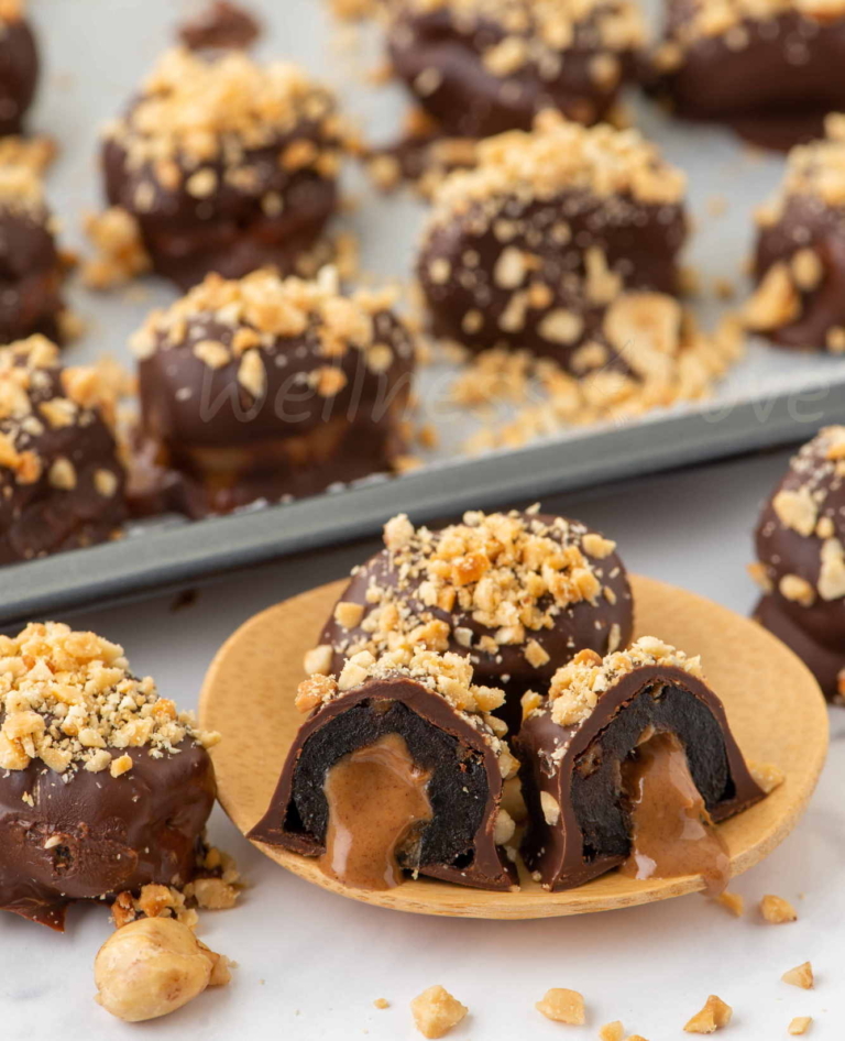 vegan mini snickers on a small wooden plate