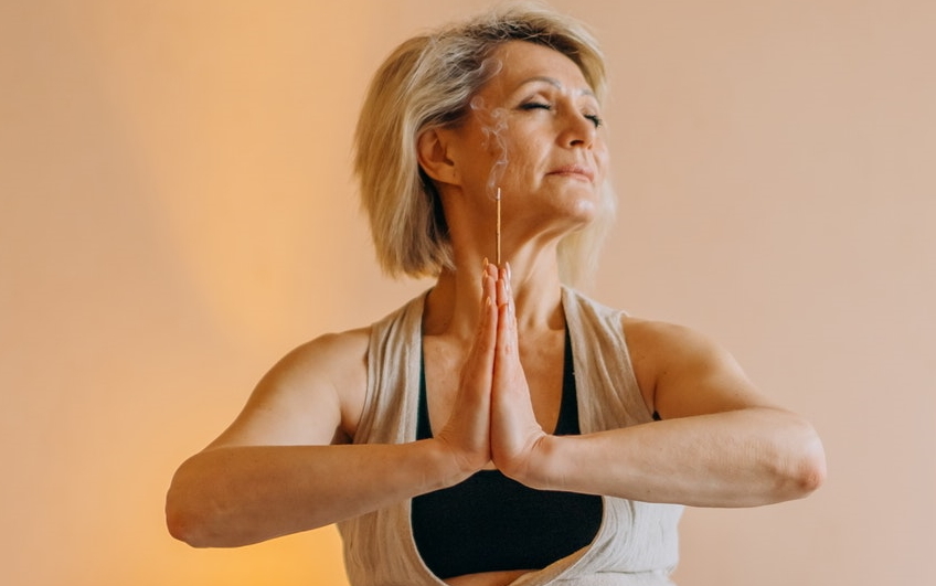 mature woman doing yoga