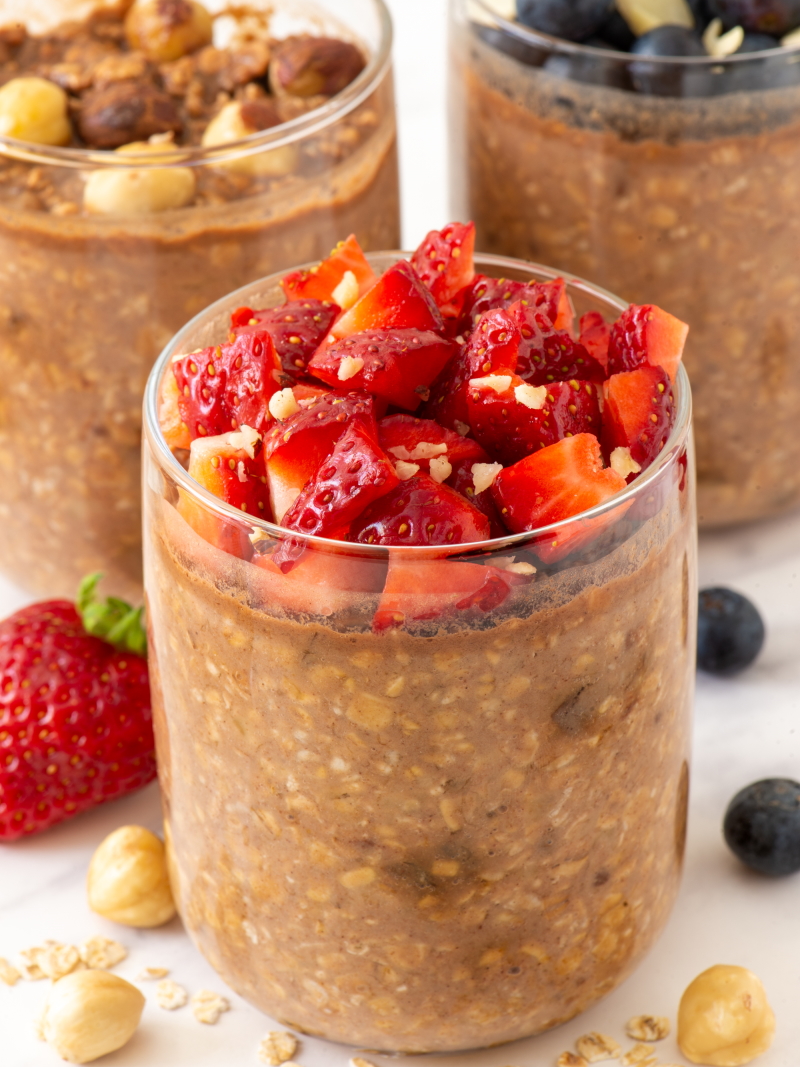 Chocolate overnight oats topped with hazelnuts