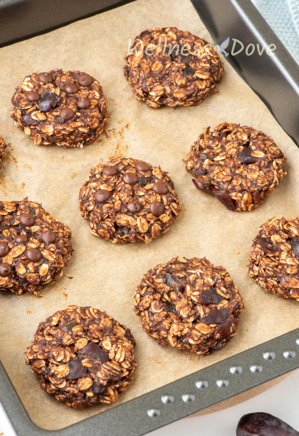 the vegan banana oatmeal breakfast cookies on a tray, 3/4 view