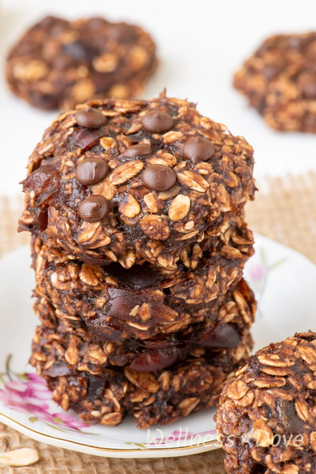 the vegan banana oatmeal breakfast cookies stacked on top of one another 