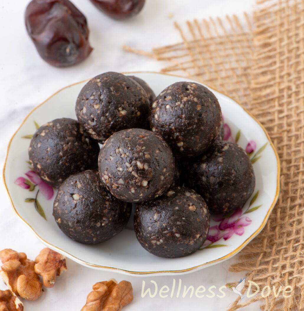 The raw vegan brownie balls in a small plate
