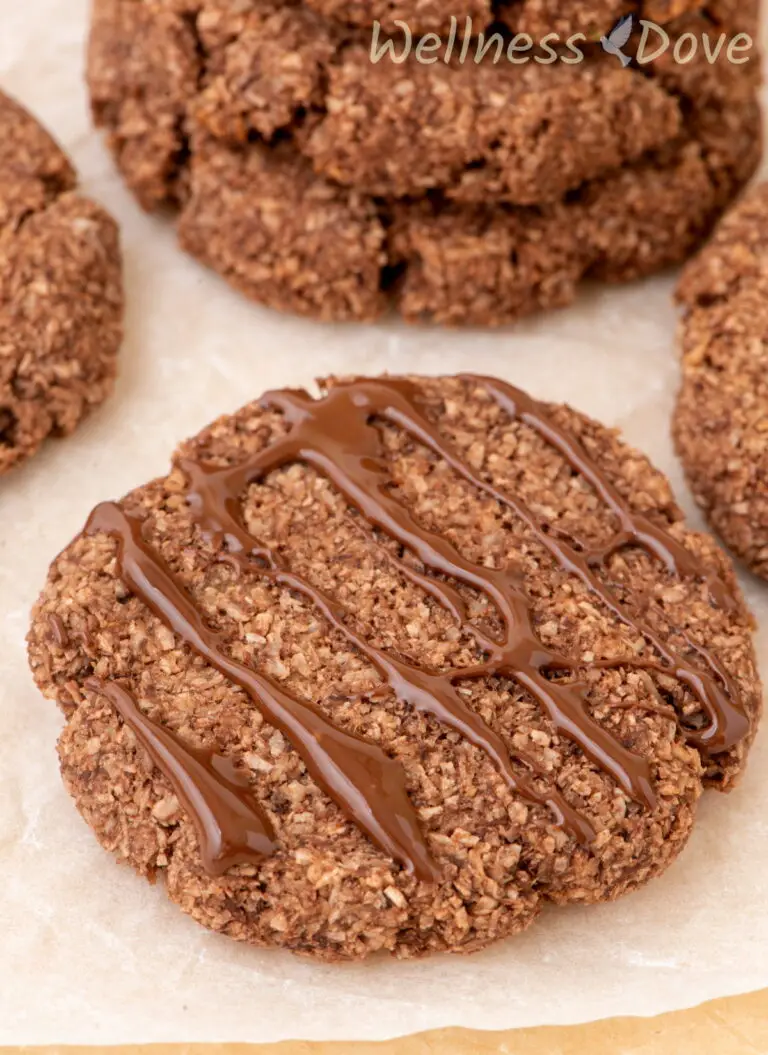 a macro shot of one of the easy 3 ingredient vegan coconut cookies