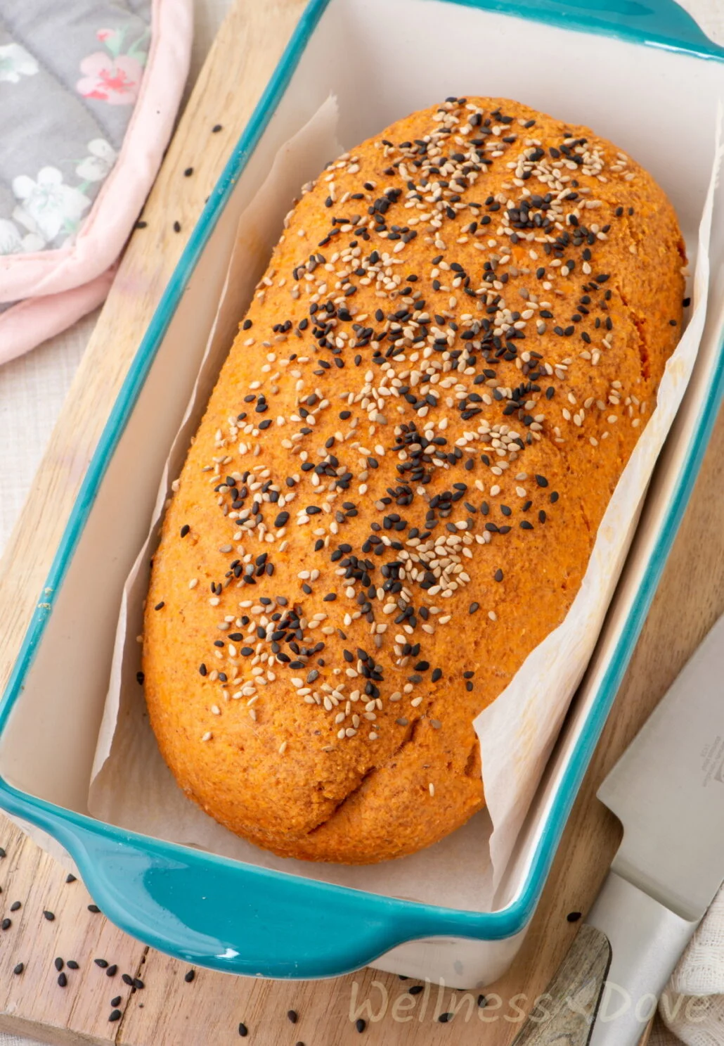 the loaf of vegan gluten free lentil bread in a baking tray