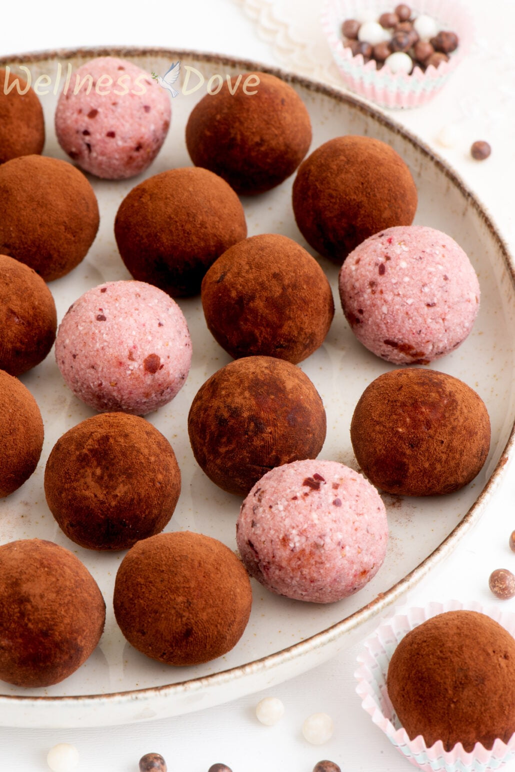 the strawberry vegan truffles in a large plate