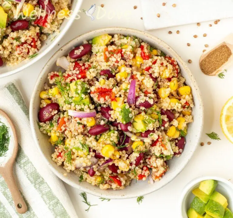 an overhead view of the vegan avocado quinoa salad  in a small bowl