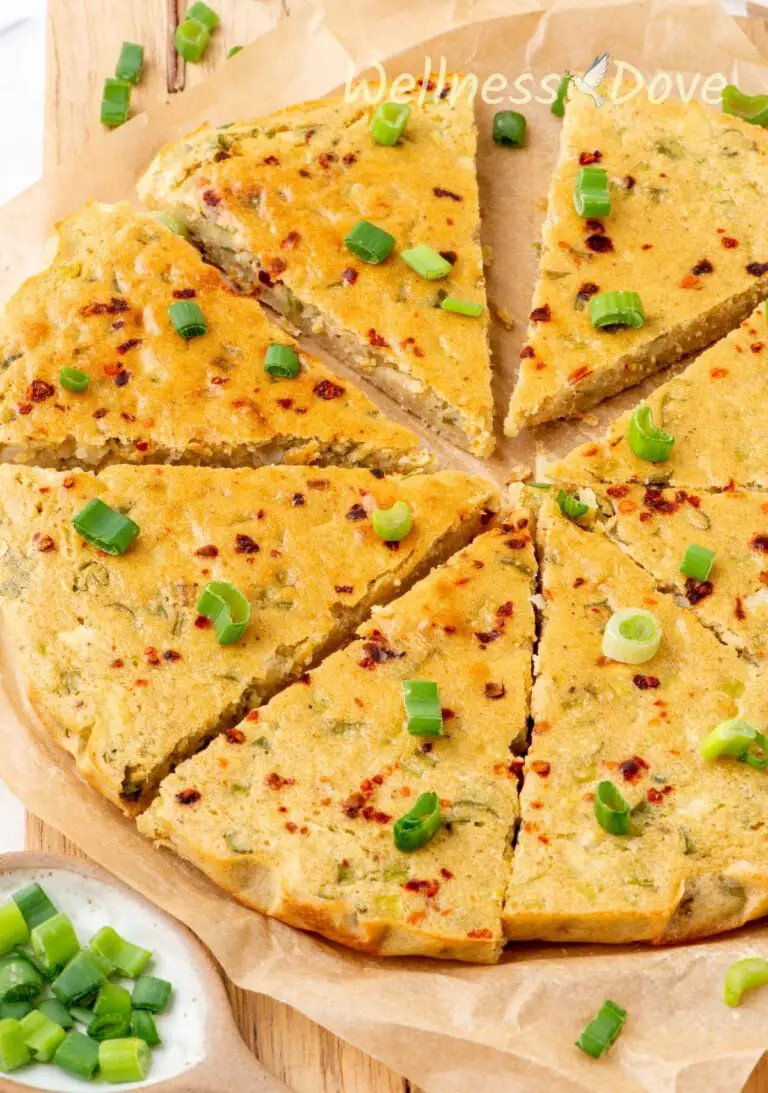 a 3/4 view of the easy gluten free chickpea flatbread, cut into pieces