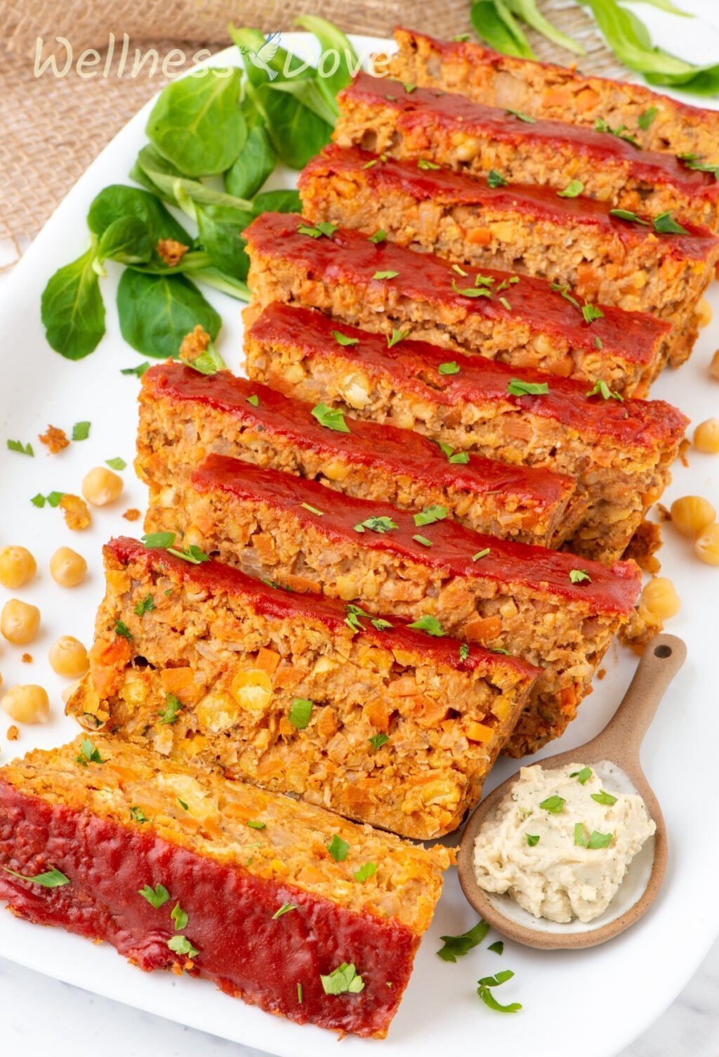 the vegan chickpea meatloaf cut into 9 pieces
