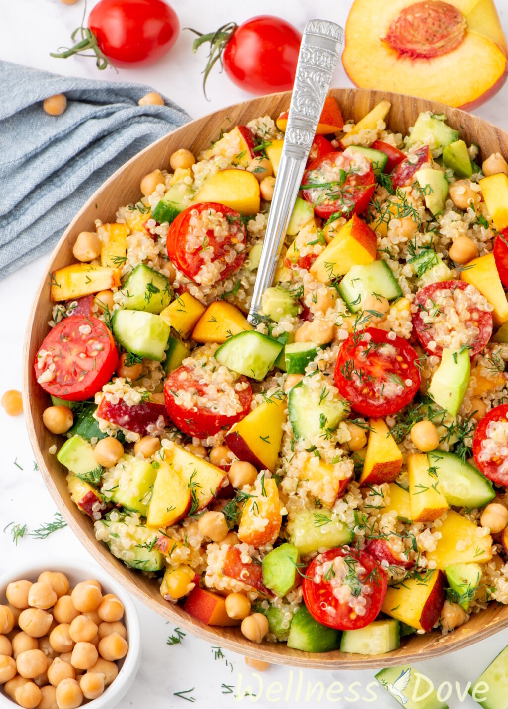 the chickpea quinoa vegan salad in a wooden bowl