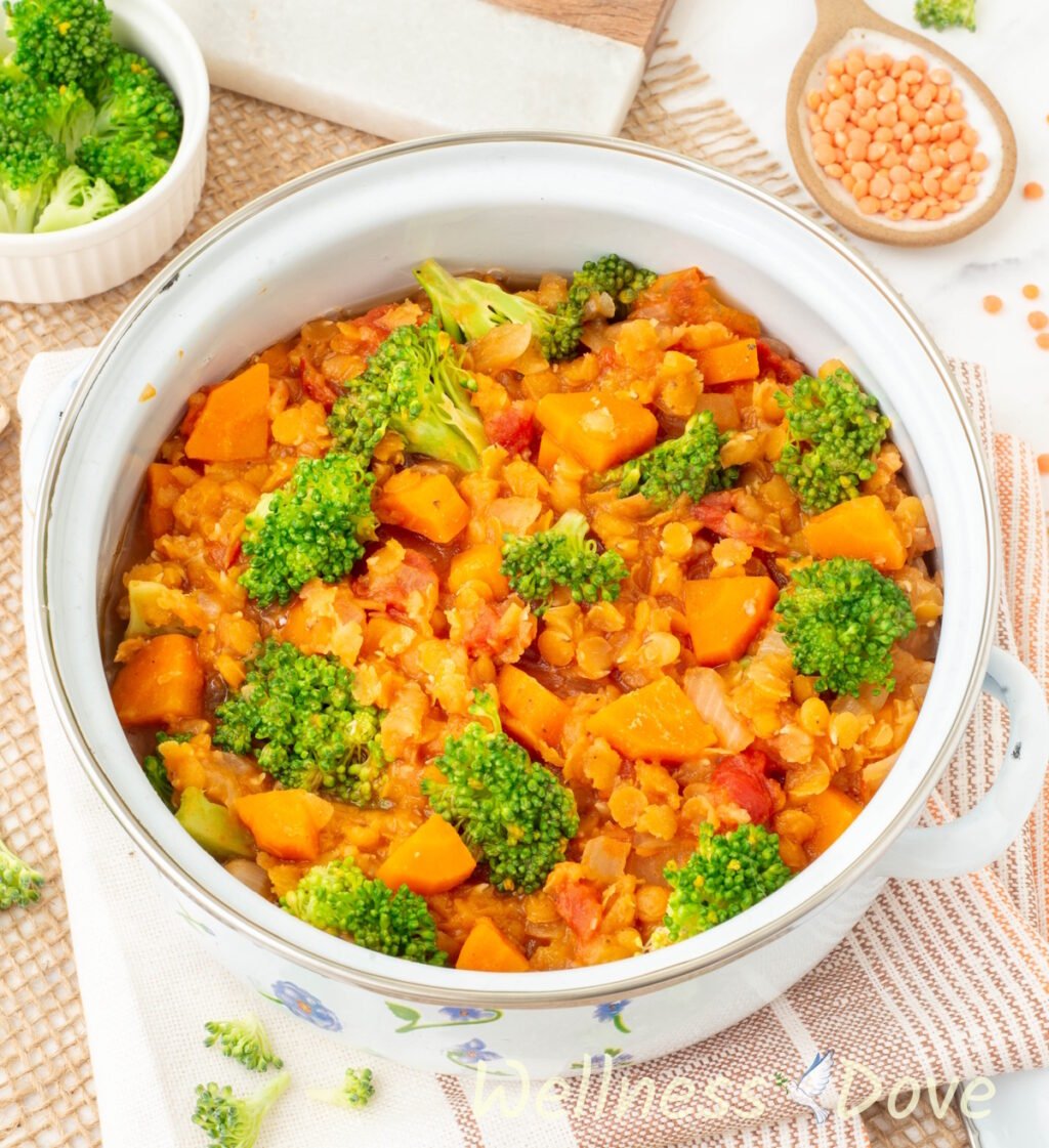 an 3/4 view of the Quick Broccoli Red Lentil Vegan Soup in  a small pot