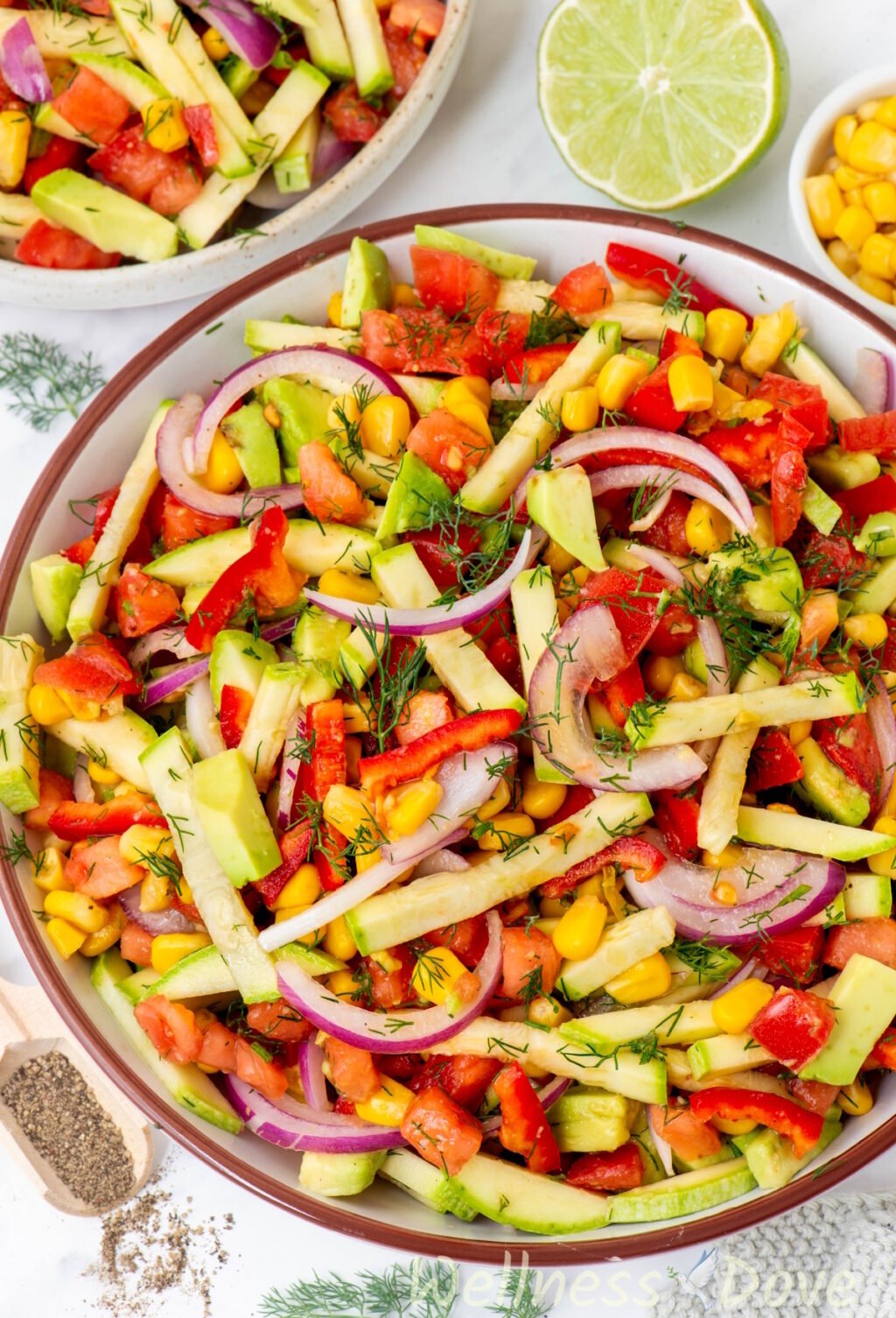 a slightly tilted overhead shot of the Refreshing Zucchini Vegan Salad in a bowl