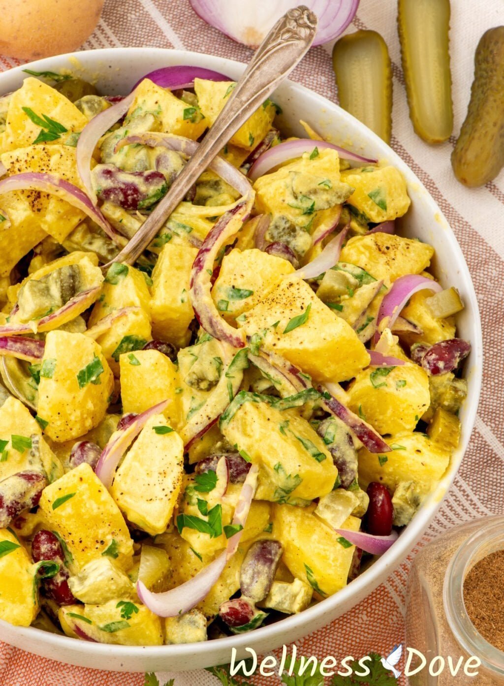 a close up shot of the creamy no mayo vegan potato salad