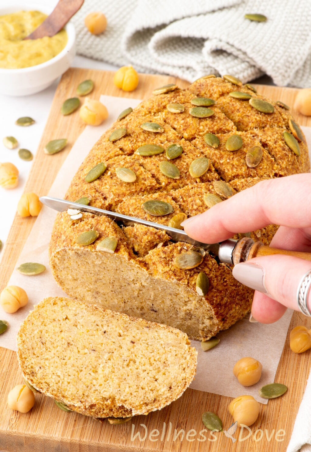 the healthy vegan gluten-free chickpea bread on top of a chopping board 