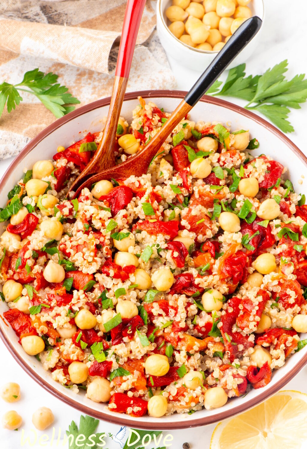 the Roasted Peppers Quinoa Salad with Chickpeas in a bowl, shown from a 3/4 angle