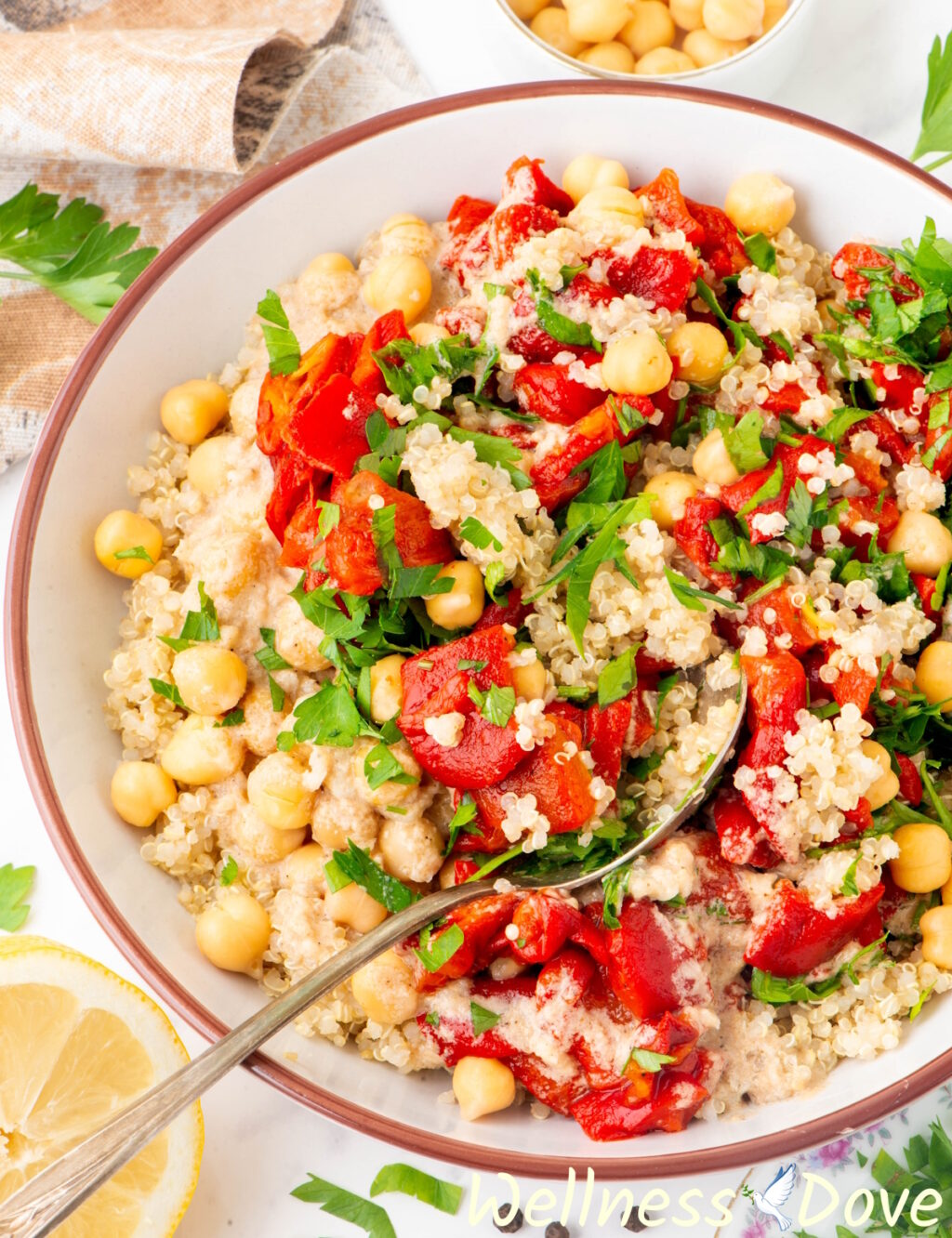 a macro overhead photo of the Roasted Peppers Quinoa Salad with Chickpeas in a bowl